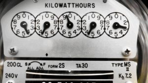 A Home Electric Meter with Dials Measuring Energy Consumption in Kilowatts