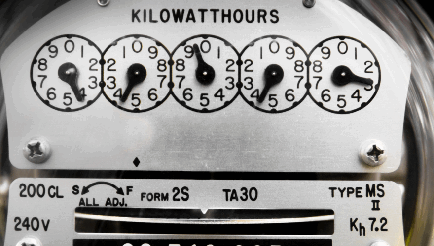 A Home Electric Meter with Dials Measuring Energy Consumption in Kilowatts