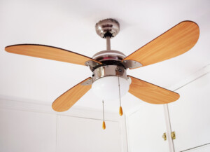Electric ceiling fan in white, suburban home